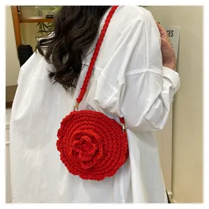 Red crochet flower crossbody bag, cute round woven straw bag for beach vacation style.