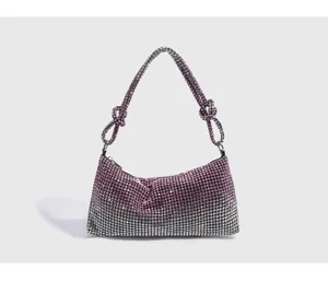 Sparkly rhinestone shoulder bag for women, elegant crystal evening purse with knotted strap for party.