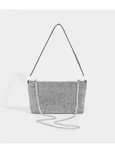 Close-up detail of sparkling rhinestone shoulder bag, chic chain strap, evening fashion chic.