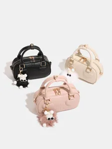 Borsa a mano da donna stile coccodrillo con ciondolo in peluche, elegante borsa a tracolla chic.