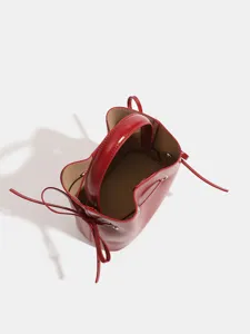 Red bucket bag for women, stylish Korean style crossbody and top handle handbag for summer chic look.