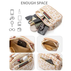 Stylish women's handbag and crossbody bag with vintage print and multiple compartments.
