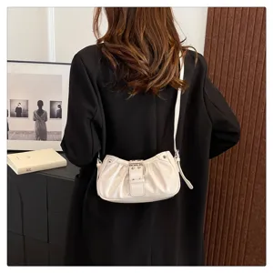 Vintage ruched underarm shoulder bag for women, trendy motorcycle style handbag with belt buckle.