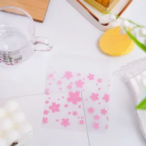 Frosted plastic gift packaging bags with pink cherry blossom pattern for jewelry candy.