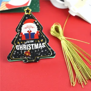 Mini biglietto d'auguri a forma di albero di Natale con cordino dorato per decorazioni.