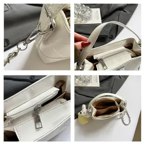 Close-up details of white quilted shoulder bag showcasing silver chain strap, zipper and lining.