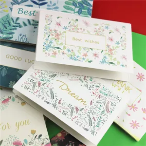 Lot de cartes de vœux avec motifs botaniques floraux et souhaits en anglais pour fêtes.