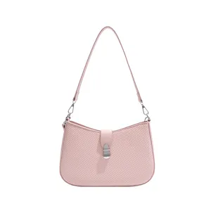 Pink French vintage style underarm shoulder bag for women, elegant minimalist PU leather purse.