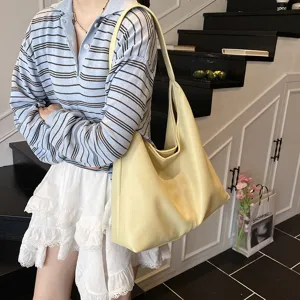 Fashionable minimalist large capacity bucket shoulder bag casual commuter leather handbag