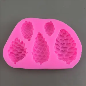Pink 5-cavity pinecone silicone mold for DIY chocolate fondant cake decoration tools.