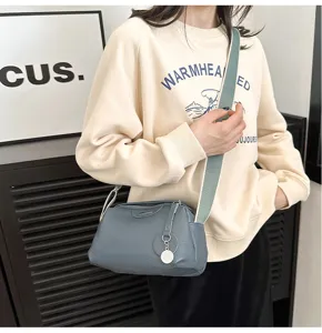 Stylish genuine leather shoulder bag for women, versatile crossbody purse, chic daily fashion.