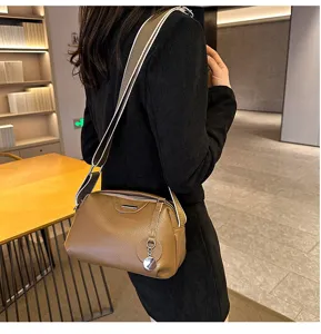Brown genuine leather crossbody shoulder bag for women, stylish versatile daily casual purse.