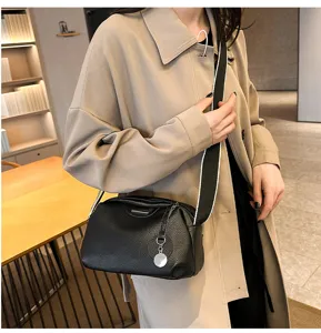 Stylish black soft leather crossbody bag for women with wide strap, modern daily casual shoulder purse