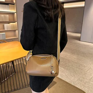 Genuine leather shoulder bag for women, stylish crossbody handbag with wide strap, brown.