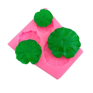 Detail view of the 3-cavity lotus leaf silicone mold showing delicate leaf texture and shape.