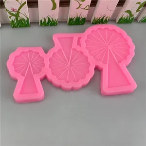 Stampo in silicone rosa con design ad albero per decorazione torte e cottura.