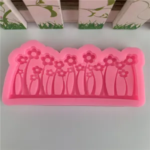 Pink silicone flower mold for baking, cake decorating, chocolate, clay, and resin crafts.