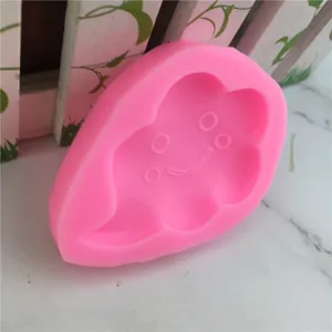 Pink silicone cloud mold, cute smiley face fondant baking tool for chocolate and cake decorating.