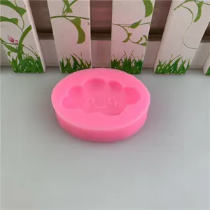 Pink silicone cloud mold for fondant cake decorating, chocolate baking tool, cute smile design.