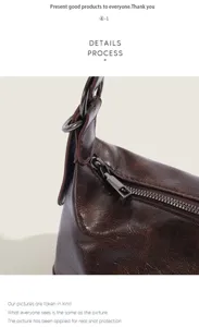 Brown leather shoulder bag zipper detail showcasing texture and quality craftsmanship.