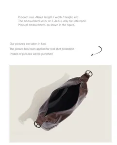 Top-down view of brown retro underarm bag showing interior zipper pocket and structure details