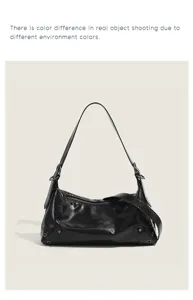 Stylish black PU leather underarm shoulder bag with pleated design and chic metal studs.