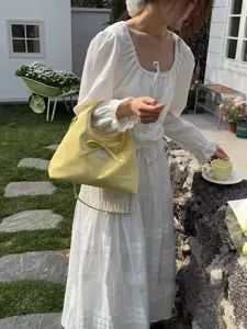 Korean sweet bow yellow shoulder bag casual messenger handbag for women daily fashion style.