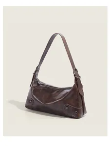Vintage brown leather underarm bag for women, stylish retro shoulder bag with metal details.