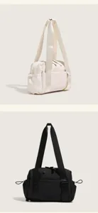 Details of the large capacity gym duffel bag showing its dual color options and structure.