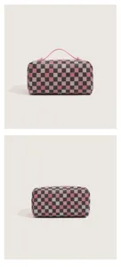 Detailed close-up view of large capacity waterproof checkered cosmetic bag with pink handle.