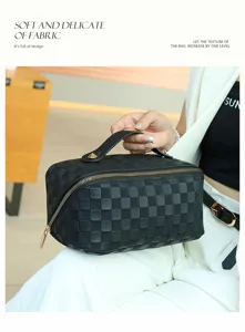 Black PU leather checkerboard cosmetic bag with gold zipper and portable handle for women.