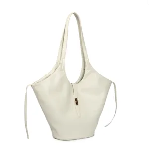 Detailed view of the elegant off-white leather tote bag, featuring a stylish winged design.