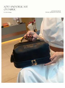 Large capacity PU makeup bag, double layer travel cosmetic organizer with handle and zipper.