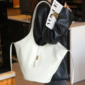 Chic white large capacity tote bag for women, stylish leather shoulder handbag.