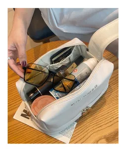 Large capacity PU makeup storage bag, multi-layer waterproof portable travel cosmetic pouch.