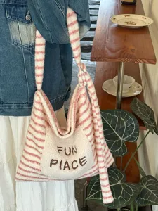Cute pink striped fuzzy tote bag for women, soft plush casual shoulder bag with embroidery.