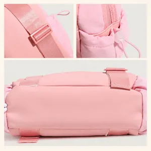 Pink waterproof casual commuter shoulder bag sports style wide strap utility bag detail