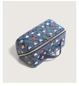Stylish printed heart cosmetic bag large capacity portable travel makeup organizer for women.