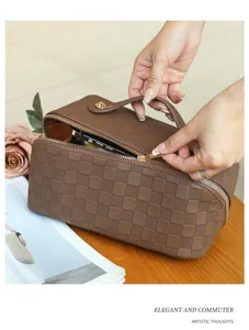 Brown PU leather checkerboard cosmetic bag with top handle and spacious interior for daily travel.