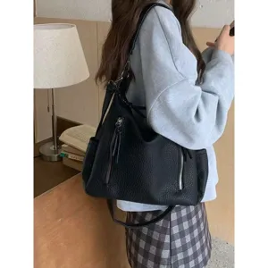 Black leather hobo shoulder bag, large capacity tote handbag for women commuting style.