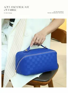 Blue checkerboard PU cosmetic bag travel storage case with top handle and zip closure.