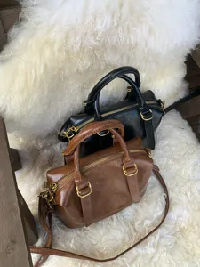 Detailed view of vintage bowling shoulder handbag, retro style commuter crossbody bag for women