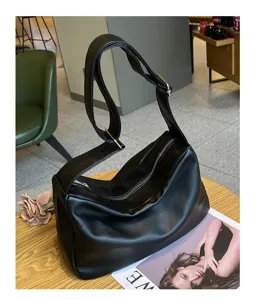 Black slouchy shoulder bag for women, wide strap commuter hobo bag, large capacity daily tote.