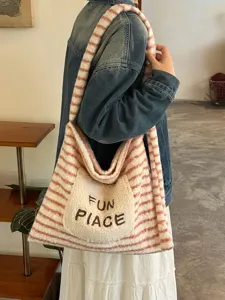 Cute plush striped tote bag with casual embroidered pocket design for daily casual use.