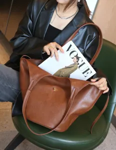 Large capacity brown leather tote bag, soft slouchy shoulder bag for women daily commuting.