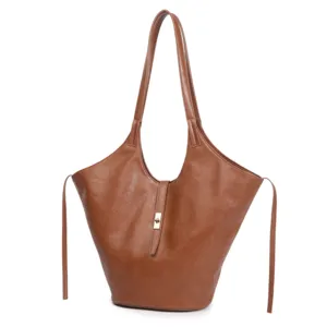 Brown leather tote bag for women, large capacity shoulder bag for daily commuting and office use.