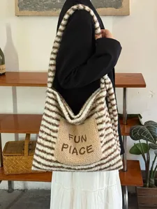 Cozy brown white striped plush tote bag with cute front pocket and embroidery detail.