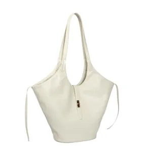 Elegant off-white faux leather tote bag with winged design and dual straps for daily use.