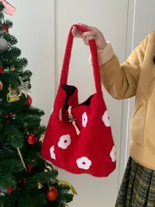 Red fluffy tote bag with white floral embroidery, cozy winter shoulder bag style.