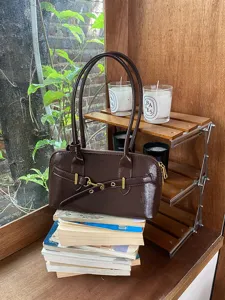 Vintage brown bowling shoulder bag, glossy texture handbag, chic retro daily purse for women.